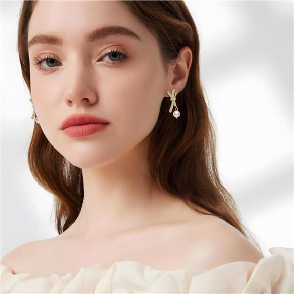 Pearl Bow Earrings | 18K Gold Plated Studs | Dainty Minimalist Jewelry - Picture 4 of 6